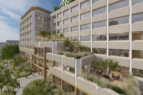 Een modern kantoorgebouw aan de Marten Meesweg met veel ramen, groene terrassen en een uitnodigende entree.